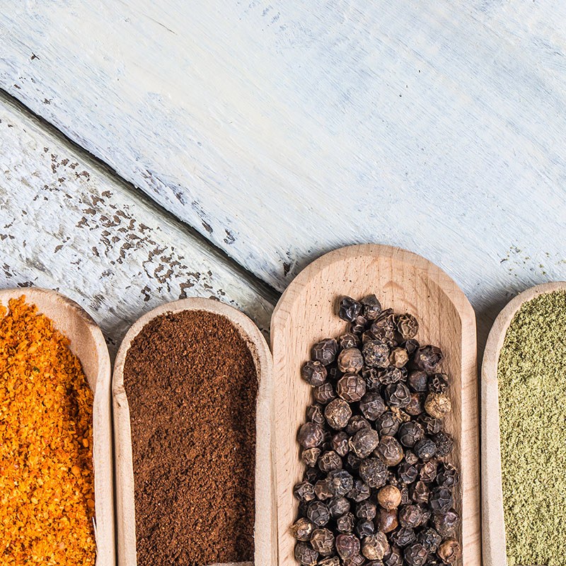 Dry Goods Assorted Spices on Wooden Background